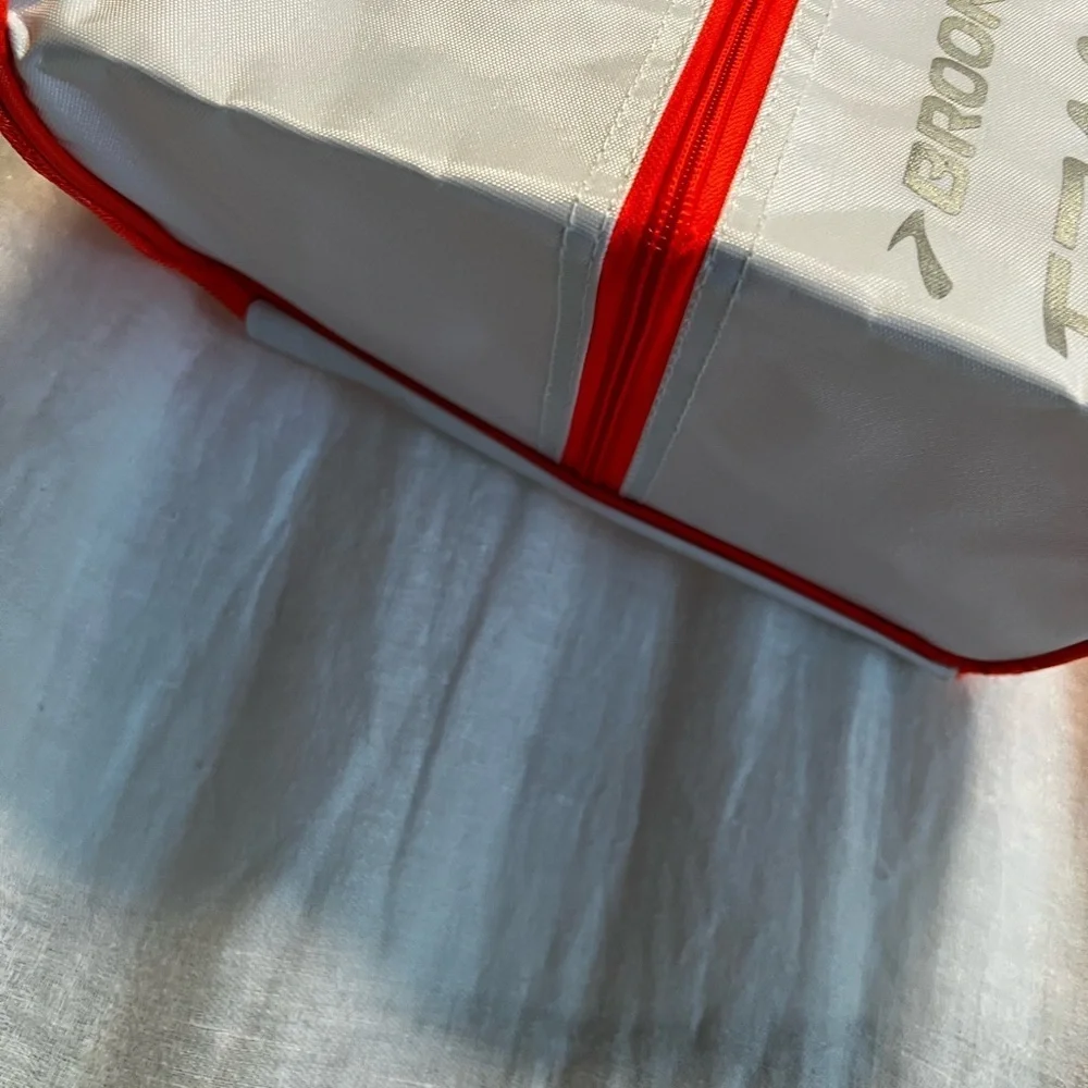 Brooks Transcend shoe bag. Like new, never used. Bright orange and white.